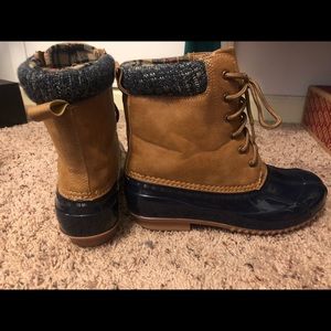 Navy Blue and Tan rain boots with plaid trimming